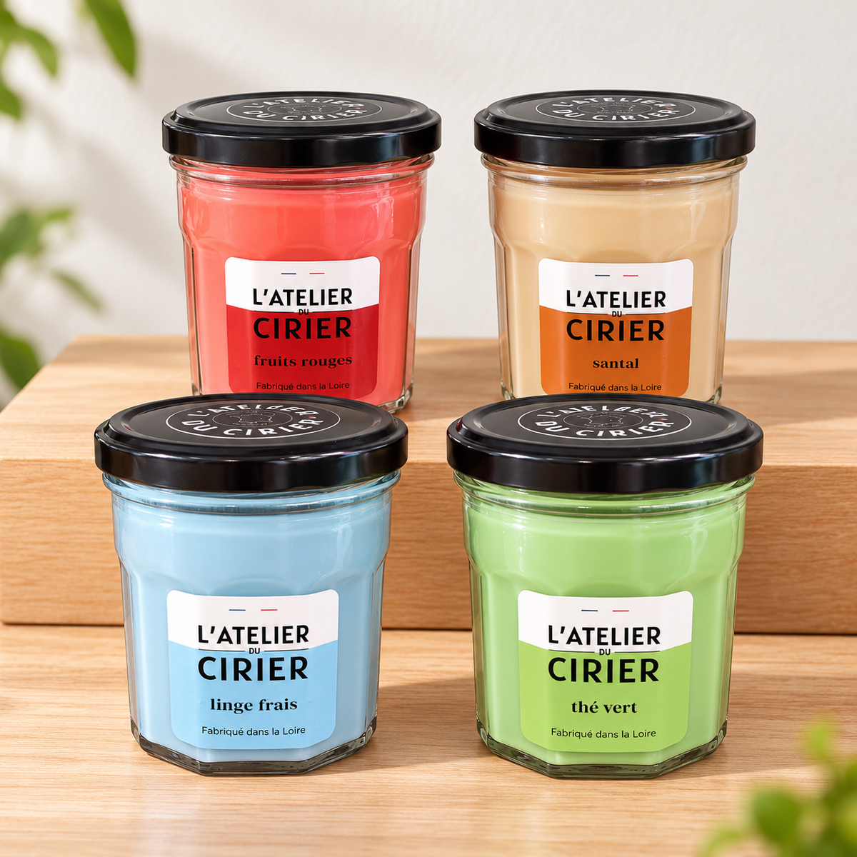Bougie artisanale en pot de confiture avec couvercle noir et cire colorée